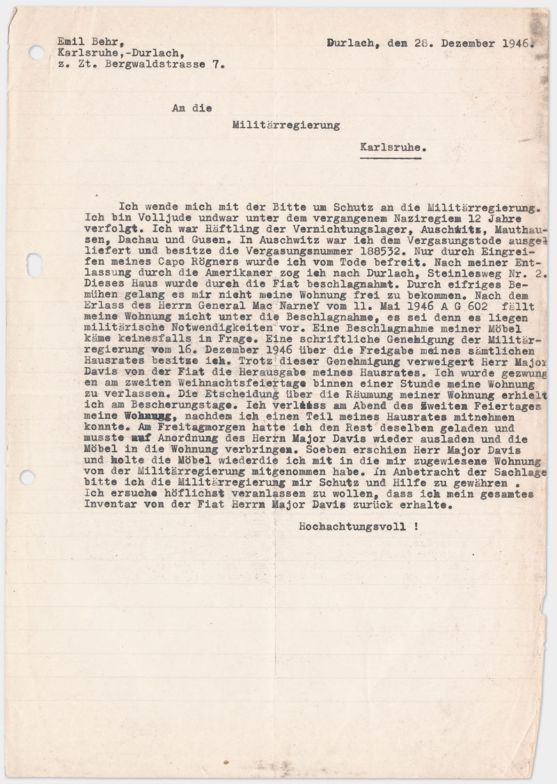  Brief an die Militärregierung Karlsruhe, auf Schreibmaschine getippt Din A4 eine Seite, liniertes Papier, schwarze Flecken an der Seite vermutlich von Schreibmaschinendurchschlag, zwei Mal gelocht links außen